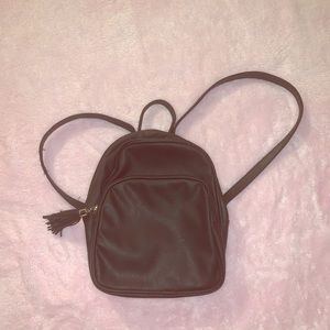 Small back pack with tassel